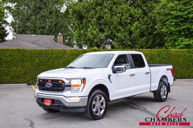 2021 Ford F-150 XLT PICKUP 4D 5 1/2 FT in White — front three-quarter view
